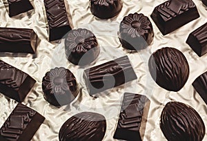 Chocolate candies on a light background