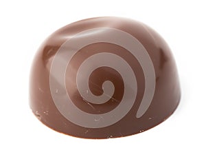 chocolate candy with caramel on white background