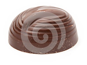 chocolate candy with caramel on white background