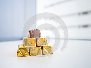 Chocolate candy in golden wrap