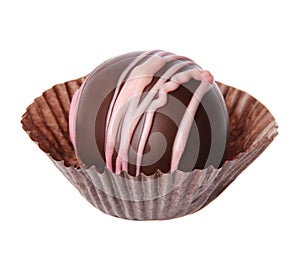 Chocolate candy isolated on white. delicious truffle in wrapper