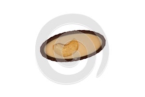 Chocolate candy with a nut isolated on a white background