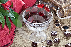 Chocolate candy in a vase still life vintage red jujube