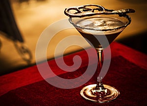 Chocolate caramel cream martini mixed cocktail glass photo