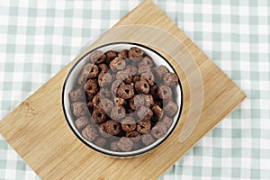 Chocolate Cereal Ring on Ceramic Bowl