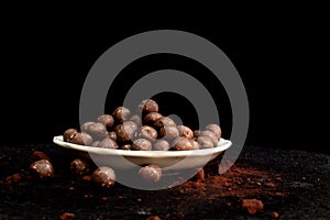 Chocolate cereals balls on plate