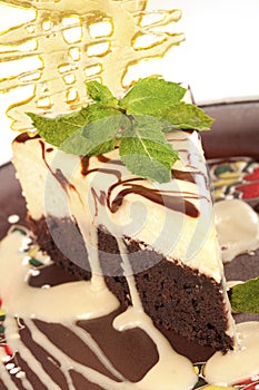 Chocolate cheesecake with caramel crust photo