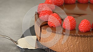 Chocolate cheesecake with raspberries.