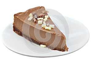 Chocolate cheesecake on white plate on  wooden table