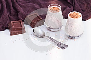 Chocolate chia pudding in glass. Healthy organic snack with omega 3