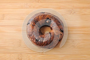 Chocolate chip bagel bread  on plate on cutting board