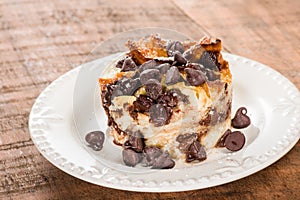 Chocolate chip bread pudding on plate