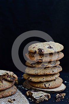 Chocolate chip cookies on dark background
