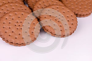 Chocolate chip cookies with filling on white background.Copy space.