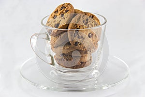 Chocolate chip cookies on a glass