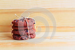 Chocolate chip cookies stack on wooden background