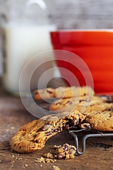 Chocolate Chip cookies on vintage Wire rack with Red mixing bowl