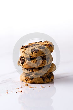 Chocolate chip cookies on white marble background