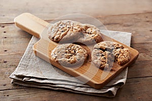 Chocolate chip cookies on wooden table