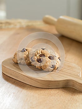 Chocolate chip cookies on wooden tray