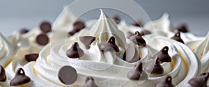 Chocolate chips on whipped cream frosting