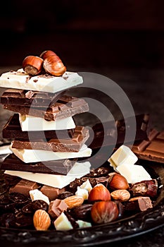 Chocolate / Chocolate bar / chocolate background/chocolate tower and nuts.