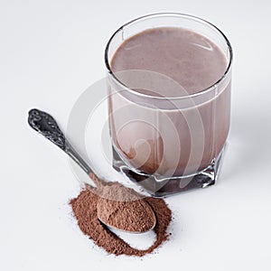 Chocolate cocoa milk powder on a white background