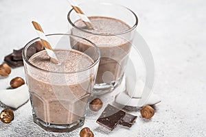 Chocolate coconut hazelnut milkshake or smoothie top view.