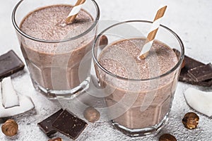 Chocolate coconut hazelnut milkshake or smoothie top view.
