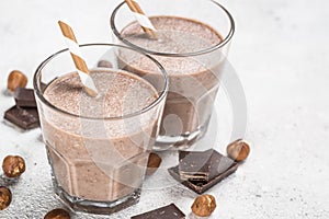 Chocolate coconut hazelnut milkshake or smoothie top view.