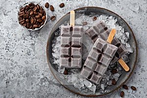 Chocolate and coffee ice cream popsicles