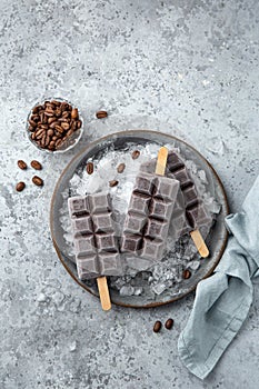 Chocolate and coffee ice cream popsicles