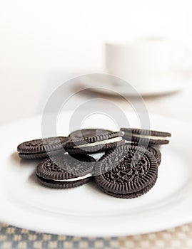 Chocolate cookie and cream. on White plate