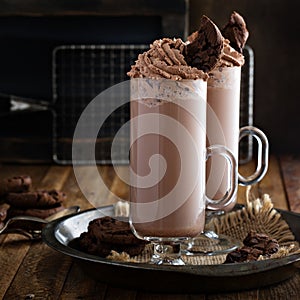 Chocolate cookie milkshake in tall mugs