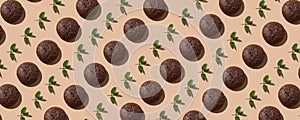 Chocolate Cookies pattern on the beige pastel background with pieces of fresh mint . Top view of chocolate chip cookies.Healthy