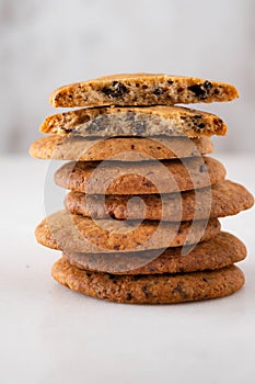 Chocolate cookies on white table. Chocolate chip cookies shot.