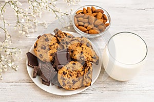 Chocolate cookies on white wooden table. Chocolate chip cookies shot.