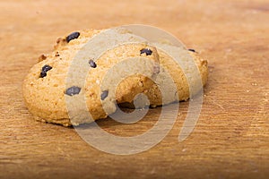 Chocolate cookies on wooden table. Chocolate chip cookies