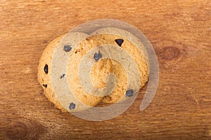 Chocolate cookies on wooden table. Chocolate chip cookies