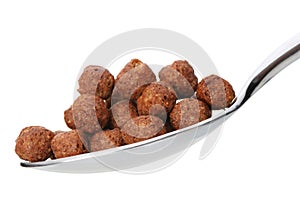 Chocolate cornflakes. A dry breakfast in a spoon.