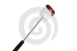 Chocolate covered marshmallow on fondue stick