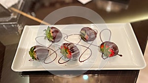 Chocolate covered strawberries a decadent dessert at a restaurant on a cruise ship