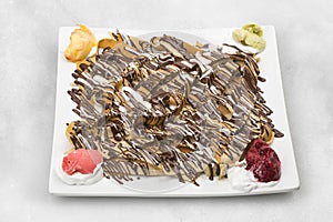 Chocolate crepe isolated on white background