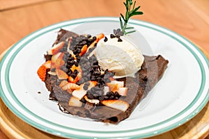 chocolate crepe with strawberry and vanilla ice-cream