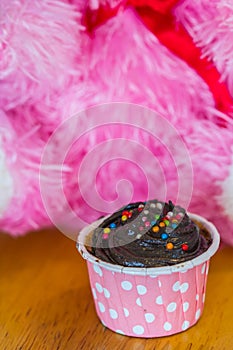 Chocolate cup cake on wood table