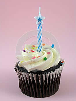 Chocolate cupcake with birthday candle