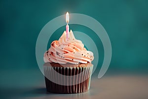 Chocolate cupcake with birthday candle, pink frosting and sugar sprinkles. Generative AI