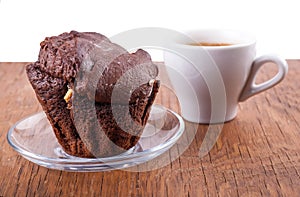 Chocolate cupcake with a cup of coffee