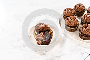 Chocolate Cupcake Sliced in Half on Kitchen Counter