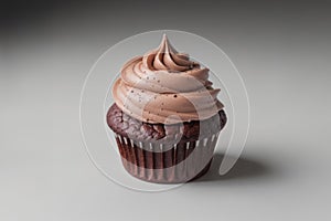 Chocolate Cupcake With Swirled Frosting on a White Table